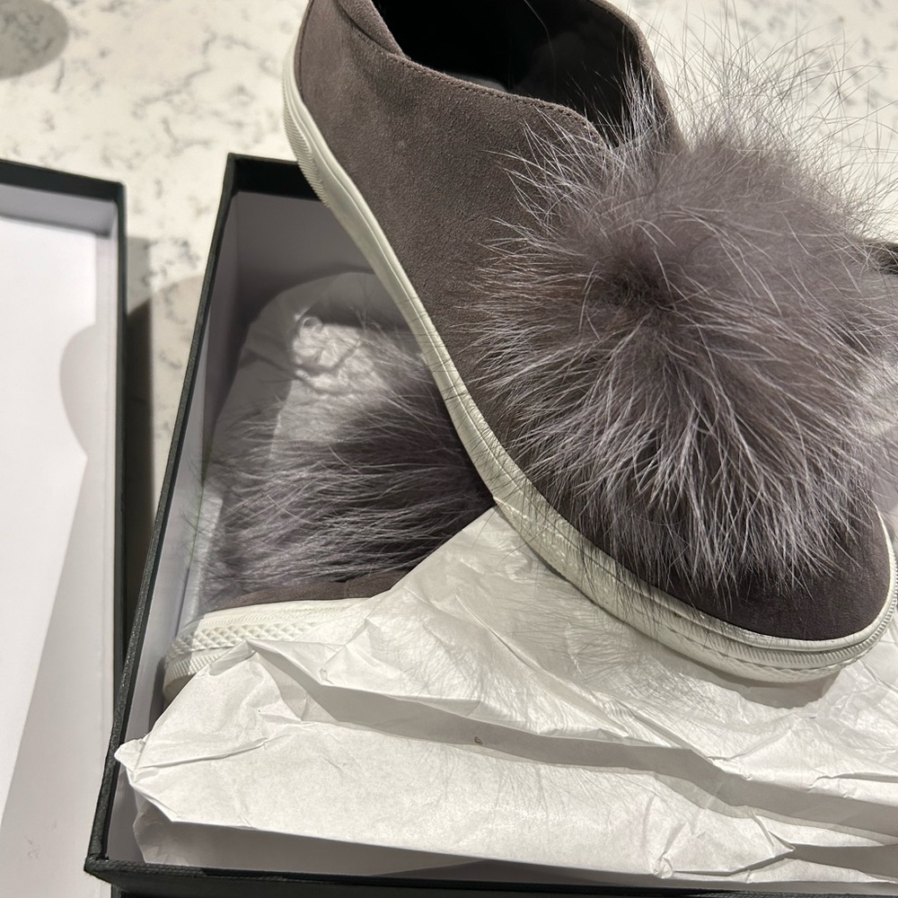 Delman fox fur Pom Pom gray suede slip ons